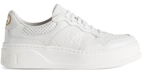 gucci gg embossed leather lace-up sneaker|Gucci white low top sneakers.